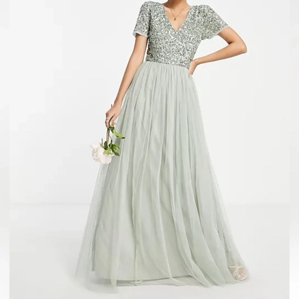 asos green bridesmaid dresses ASOS DESIGN bridesmaids satin plunge neckline dropped waist midi dress in sage green